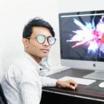 man using iMac